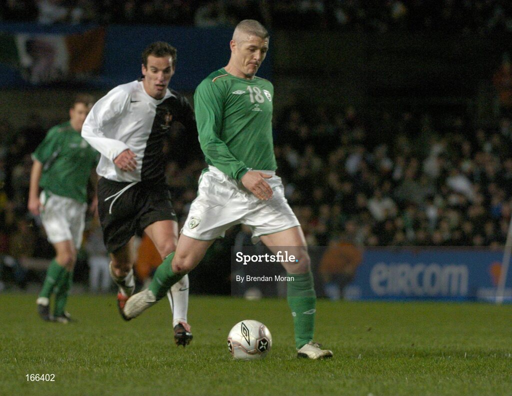 9 February 2005; Graham Kavanagh, Republic of Ireland, in action against Petit, Portugal. International Friendly, Republic of Ireland v Portugal, Lansdowne Road, Dublin. Picture credit; Brendan Moran / SPORTSFILE