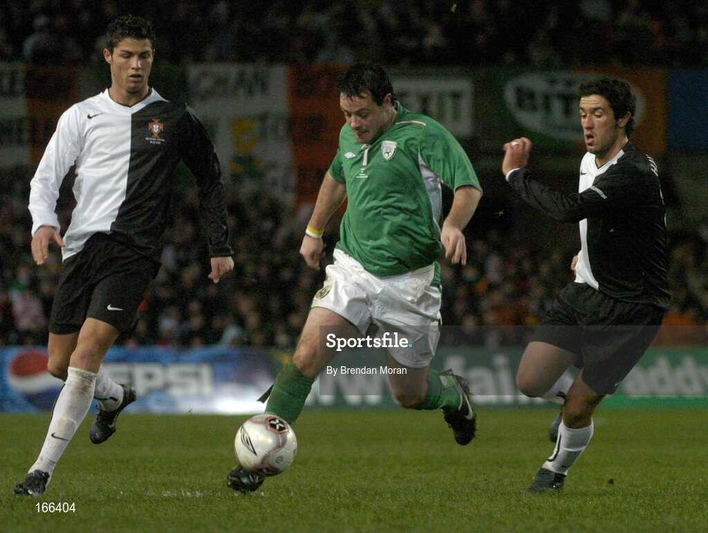 9 February 2005; Andy Reid, Republic of Ireland, in action against Cristiano Ronaldo, left, and Hugo Viana, Portugal. International Friendly, Republic of Ireland v Portugal, Lansdowne Road, Dublin. Picture credit; Brendan Moran / SPORTSFILE