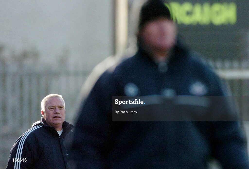 13 February 2005; Westmeath manager Paidi O'Se and Cork manager Billy Morgan, right, watch the closing stages of the game. Allianz National Football League, Division 1A, Westmeath v Cork, Cusack Park, Mullingar, Co. Westmeath. Picture credit; Pat Murphy / SPORTSFILE