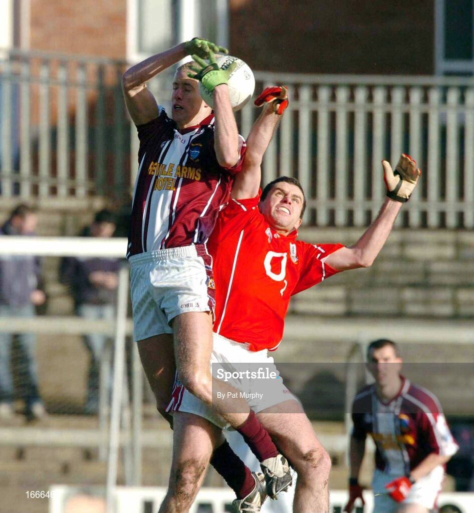 13 February 2005; Derek Glennon, Westmeath, in action against Martin Cronin, Cork. Allianz National Football League, Division 1A, Westmeath v Cork, Cusack Park, Mullingar, Co. Westmeath. Picture credit; Pat Murphy / SPORTSFILE