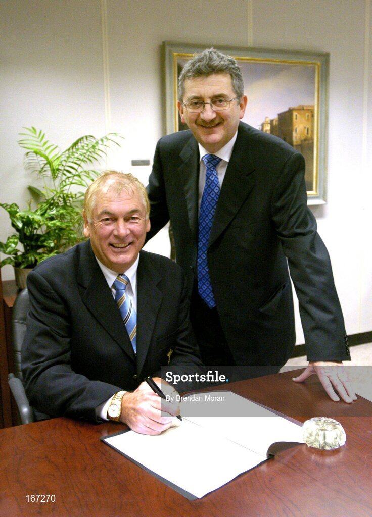 21 February 2005; AIB, one of the partners in Ireland's successful bid to bring the Ryder Cup to Ireland in 2006, has strengthened its Ryder Cup links by signing Christy O'Connor Jnr to be their Ryder Cup ambassador up to and including the event in September 2006. At the signing of a contract in relation to his role as AIB Ambassador for Ryder Cup 2006 with Christy is Billy Andrews of AIB. AIB Bankcentre, Ballsbridge, Dublin. Picture credit; Brendan Moran / SPORTSFILE