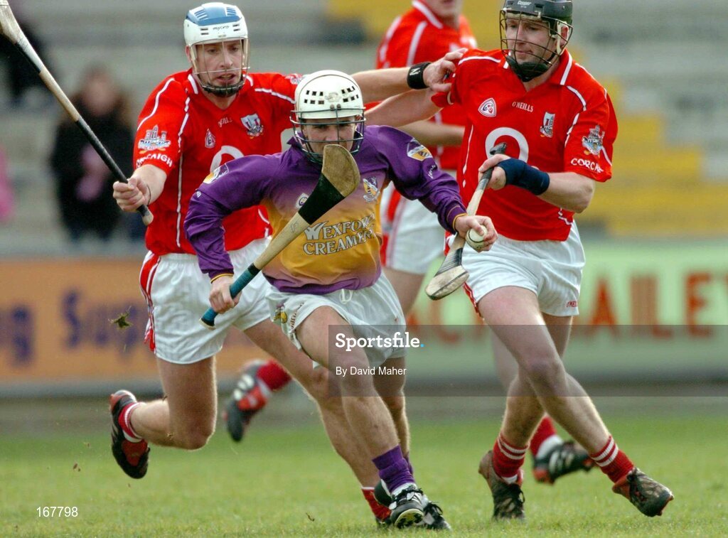 27 February 2005; Des Mythen, Wexford, in action against Ronan Curran, left and Pat Mulcahy, Cork. Allianz National Hurling League, Division 1B, Wexford v Cork, Wexford Park, Wexford. Picture credit; David Maher / SPORTSFILE