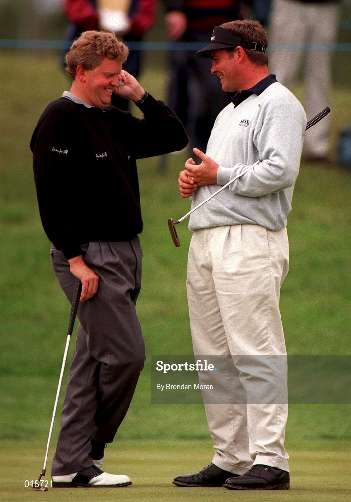 4 July 1997; Colin Montgomerie, left, of Scotland in conversation with Darren Clarke of Northern Ireland on the 18th green during the second round of the Murphy's Irish Open Golf Championship at Druid's Glen Golf Club in Wicklow. Photo by Brendan Moran/Sportsfile