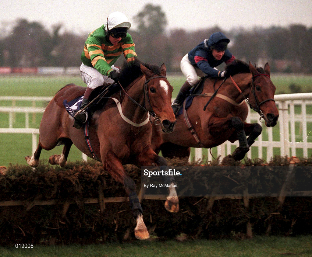 24 January 1999; Istabraq, with Charlie Swan up, jumps the last ahead of French Holly, with Adrian Maguire up, on the way to winning the AIG Europe Champion Hurdle at Leopardstown Racecourse in Dublin. Photo by Ray McManus/Sportsfile