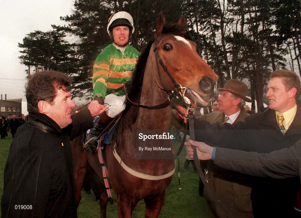 24 January 1999; Jockey Charlie Swan is congratulated by winning owner JP McManus after winning the AIG Europe Champion Hurdle on Istabraq at Leopardstown Racecourse in Dublin. Photo by Ray McManus/Sportsfile