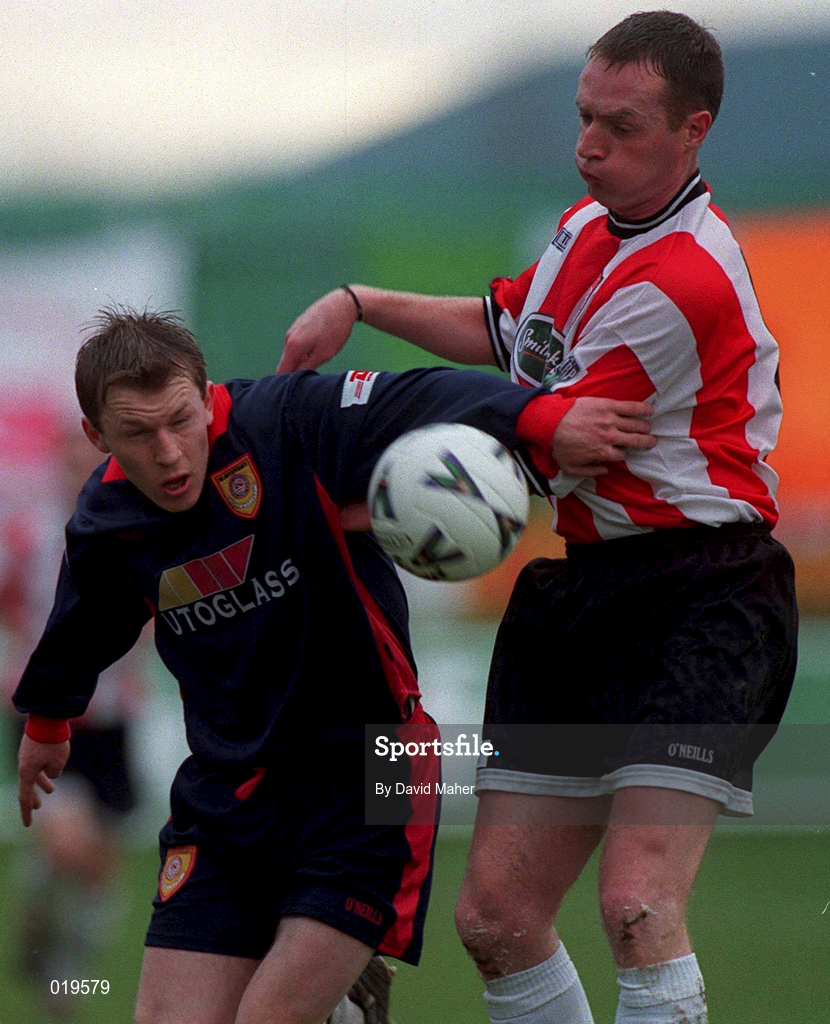 14 February 1999; Trevor Molloy of St Patrick's Athletic in action against Paul Curran of Derry City during the Harp Lager National League Premier Division match between Derry City and St Patrick's Athletic at The Bradywell in Derry. Photo by David Maher/Sportsfile