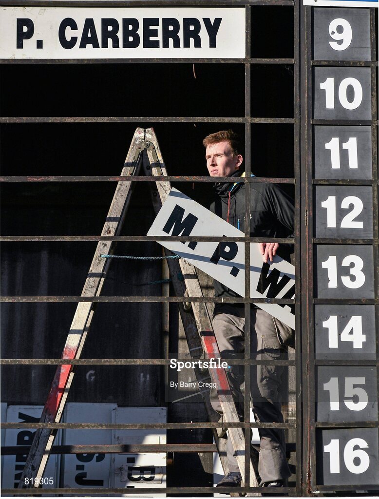 27 December 2013; Racecourse official Craig Byrne prepares the results board ahead of the The Paddy Power iPad App 3-Y-O Maiden Hurdle. Leopardstown Christmas Racing Festival 2013, Leopardstown Racetrack, Leopardstown, Co. Dublin. Picture credit: Barry Cregg / SPORTSFILE