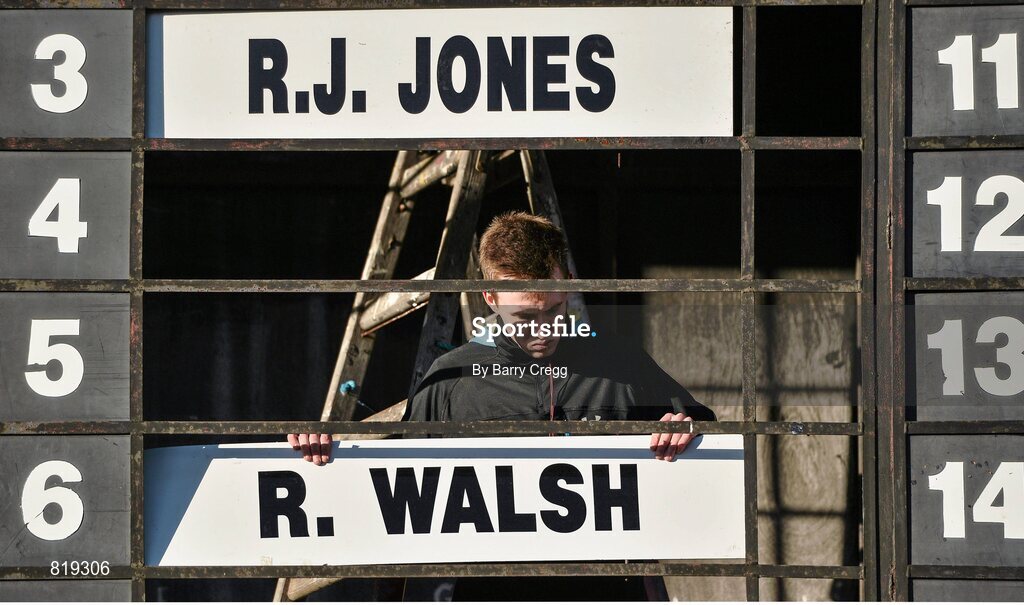 27 December 2013; Racecourse official Craig Byrne prepares the results board ahead of the The Paddy Power iPad App 3-Y-O Maiden Hurdle. Leopardstown Christmas Racing Festival 2013, Leopardstown Racetrack, Leopardstown, Co. Dublin. Picture credit: Barry Cregg / SPORTSFILE