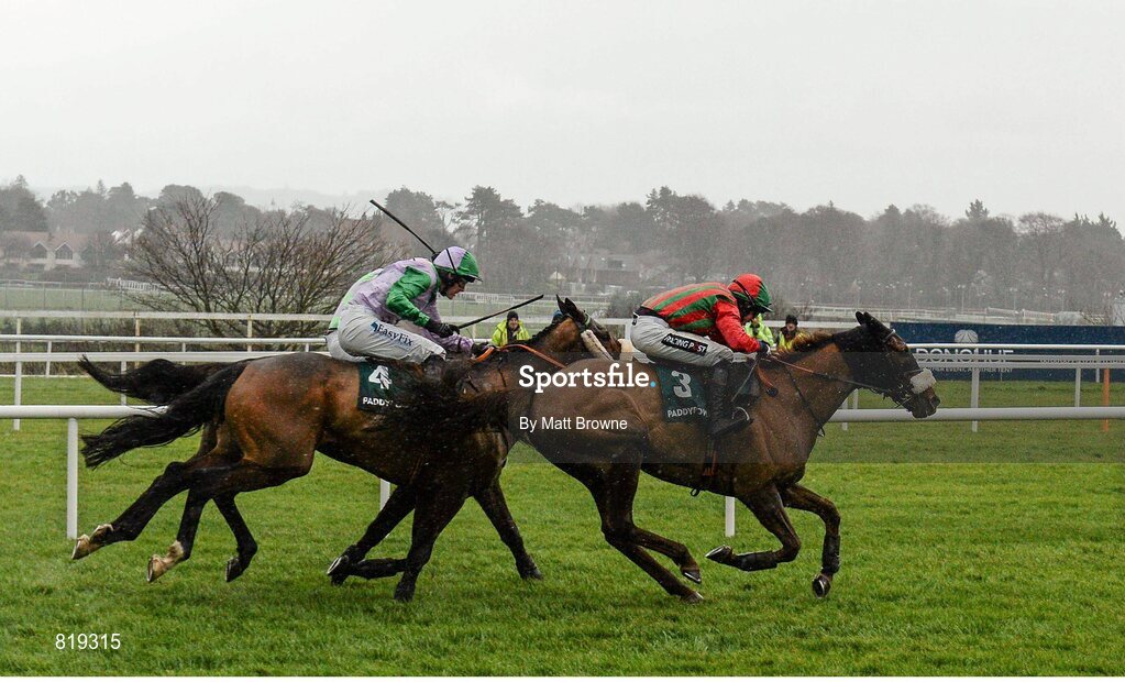 27 December 2013; Benefficient, right, with Bryan Cooper up, on the way to winning the Paddy Power Dial-a-Bet Steeplechase from Hidden Cyclone, left, with Andrew McNamara up, and Arvike Ligeonniere, hidden, with Ruby Walsh up. Leopardstown Christmas Racing Festival 2013, Leopardstown Racetrack, Leopardstown, Co. Dublin. Picture credit: Matt Browne / SPORTSFILE