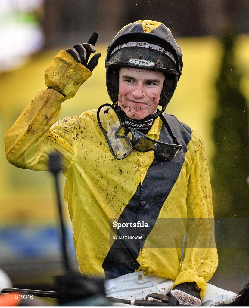 27 December 2013; Danny Mullins celebrates after winning the Paddy Power Future Champions Novice Hurdle on The Tullow Tank. Leopardstown Christmas Racing Festival 2013, Leopardstown Racetrack, Leopardstown, Co. Dublin. Picture credit: Matt Browne / SPORTSFILE