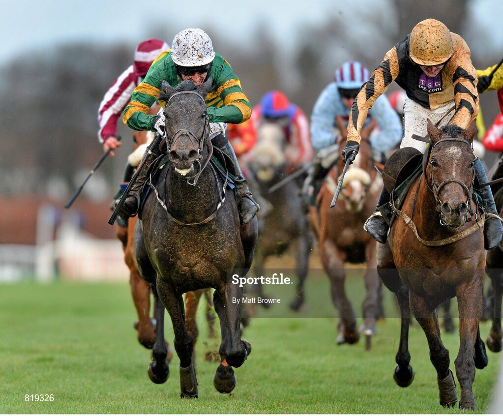 27 December 2013; Plinth, left, with Tony McCoy up, on their way to winning the The Paddy Power iPad App 3-Y-O Maiden Hurdle from second place Ivan Grozny, right, with Ruby Walsh. Leopardstown Christmas Racing Festival 2013, Leopardstown Racetrack, Leopardstown, Co. Dublin. Picture credit: Matt Browne / SPORTSFILE