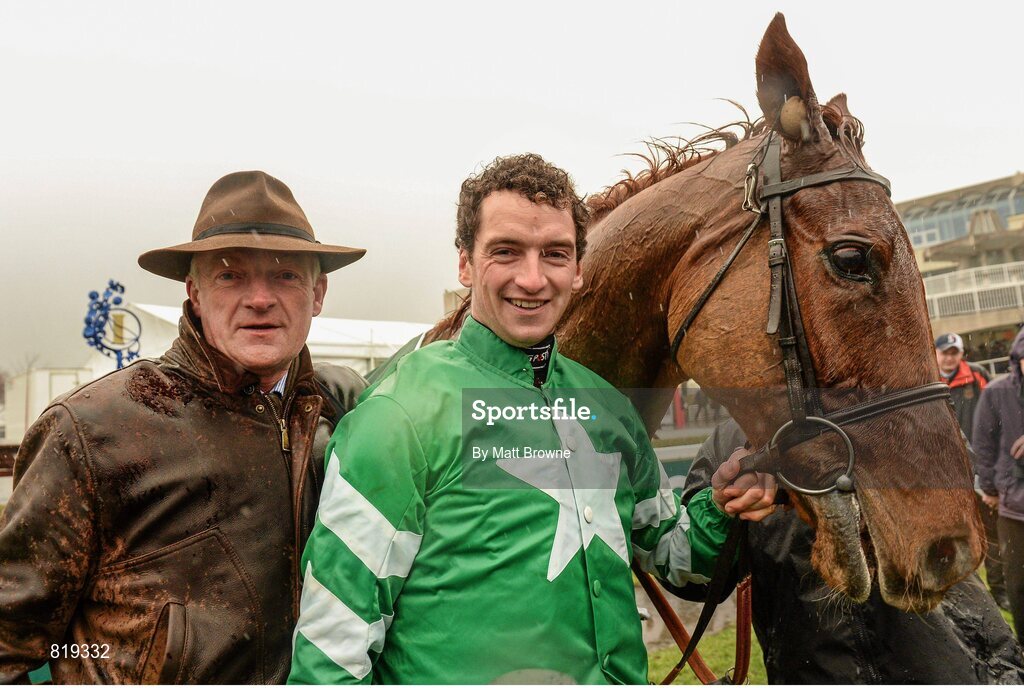 27 December 2013; Owner of Rockyaboya Patrick Mullins, right, with his father, and trainer of  Rockyaboya, Willie Mullins after winning the Paddy Power Steeplechase. Leopardstown Christmas Racing Festival 2013, Leopardstown Racetrack, Leopardstown, Co. Dublin. Picture credit: Matt Browne / SPORTSFILE