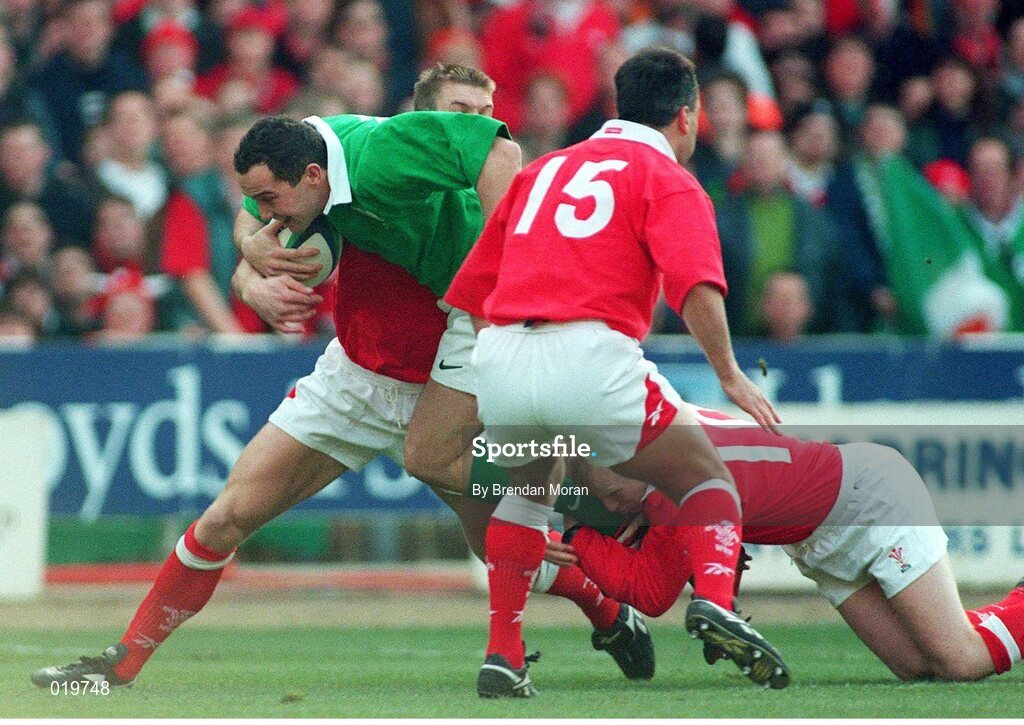 20 February 1999; Conor O'Shea, Ireland, in action against Neil Jenkins, Dafydd James and Shame Howarth, no.15 Wales. Five Nations Rugby Championship, Ireland v Wales, Wembley Stadium, London, England. Picture credit: Brendan Moran / SPORTSFILE