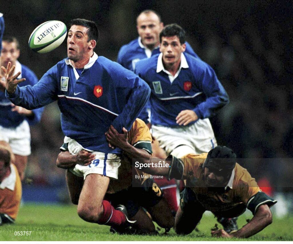 6 November 1999; Arnaud Costes, France, is tackled by George Gregan and Stephen Larkham, Australia. 1999 Rugby World Cup Final, Millennium Stadium, Cardiff, Wales. Picture credit: Matt Browne / SPORTSFILE