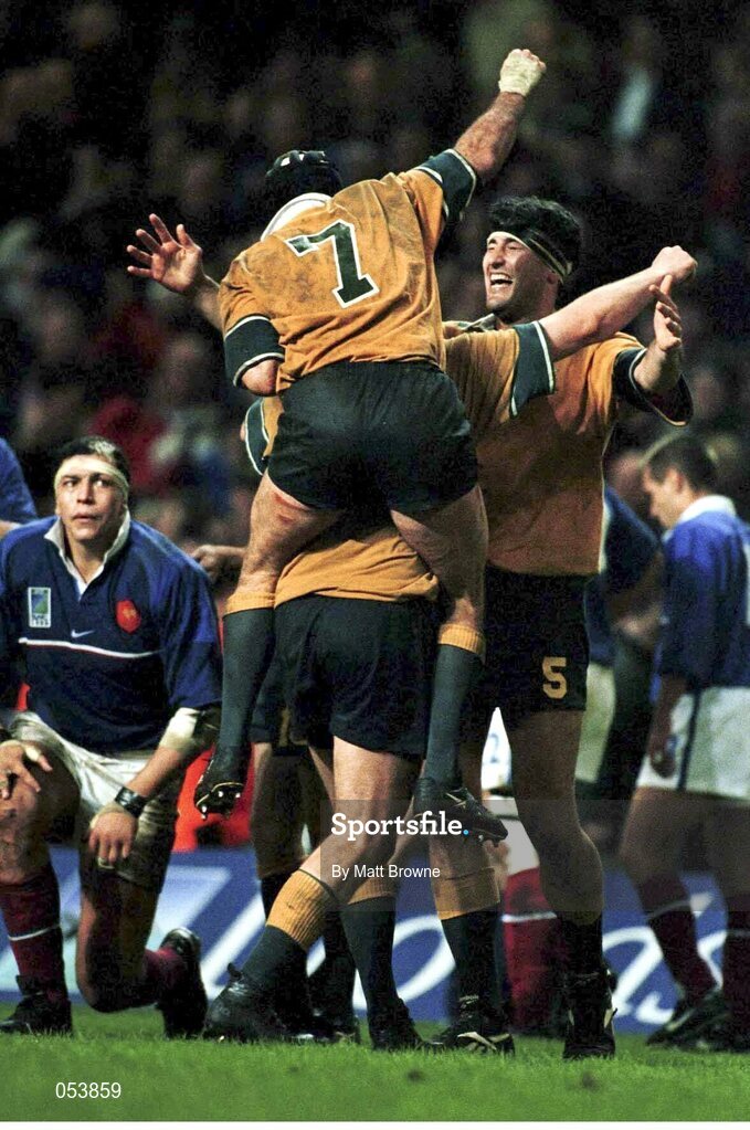 6 November 1999; Australian captain John Eales and David Wilson (7) celebrate their victory over France.1999 Rugby World Cup Final, Millennium Stadium, Cardiff, Wales. Picture credit: Matt Browne / SPORTSFILE