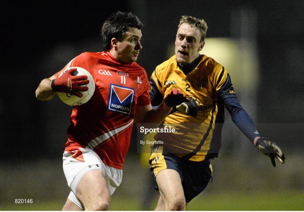 4 January 2014; Brian White, Louth, in action against William Lowry, DCU. Bord na Mona O'Byrne Cup, Group D, Round 1, Louth v DCU, Páirc Séamus Mhic hEochaidh, Haggardstown, Co Louth. Photo by Sportsfile