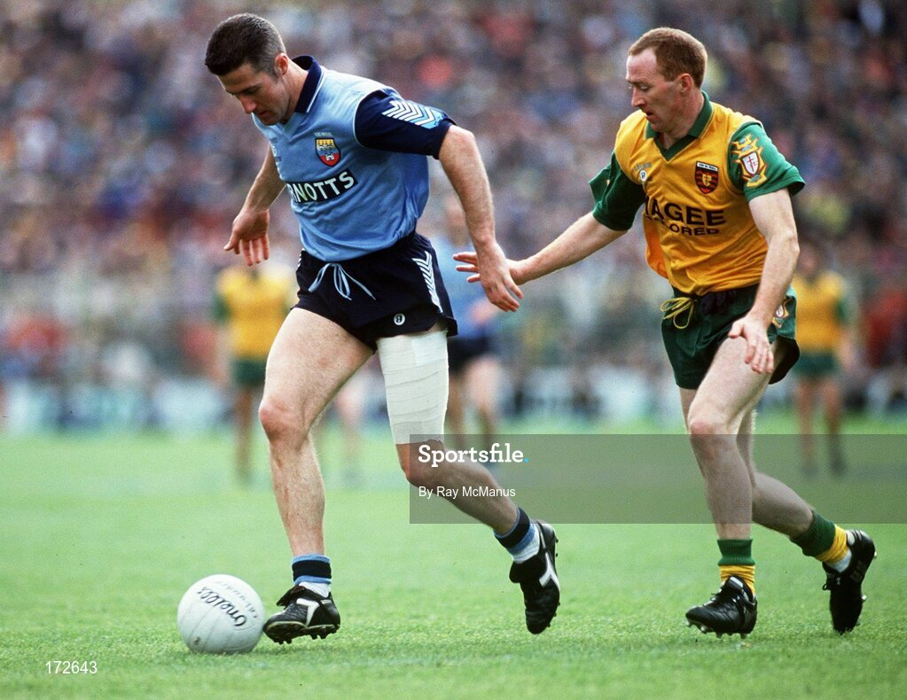 9 May 1993; Paul Clarke of Dublin in action against Martin Shovelin of Donegal during the Royal Liver Assurance National Football League Final match between Dublin and Donegal at Croke Park, Dublin. Photo by Ray McManus/Sportsfile