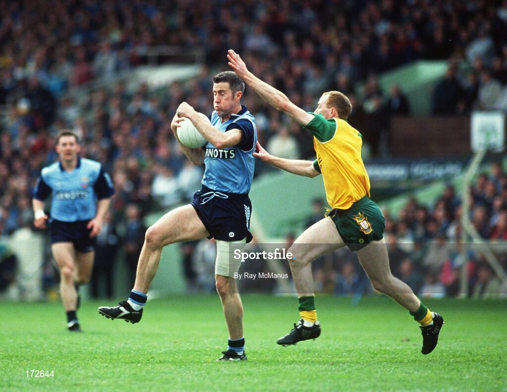 9 May 1993; Paul Clarke of Dublin in action against Martin Shovelin of Donegal during the Royal Liver Assurance National Football League Final match between Dublin and Donegal at Croke Park, Dublin. Photo by Ray McManus/Sportsfile