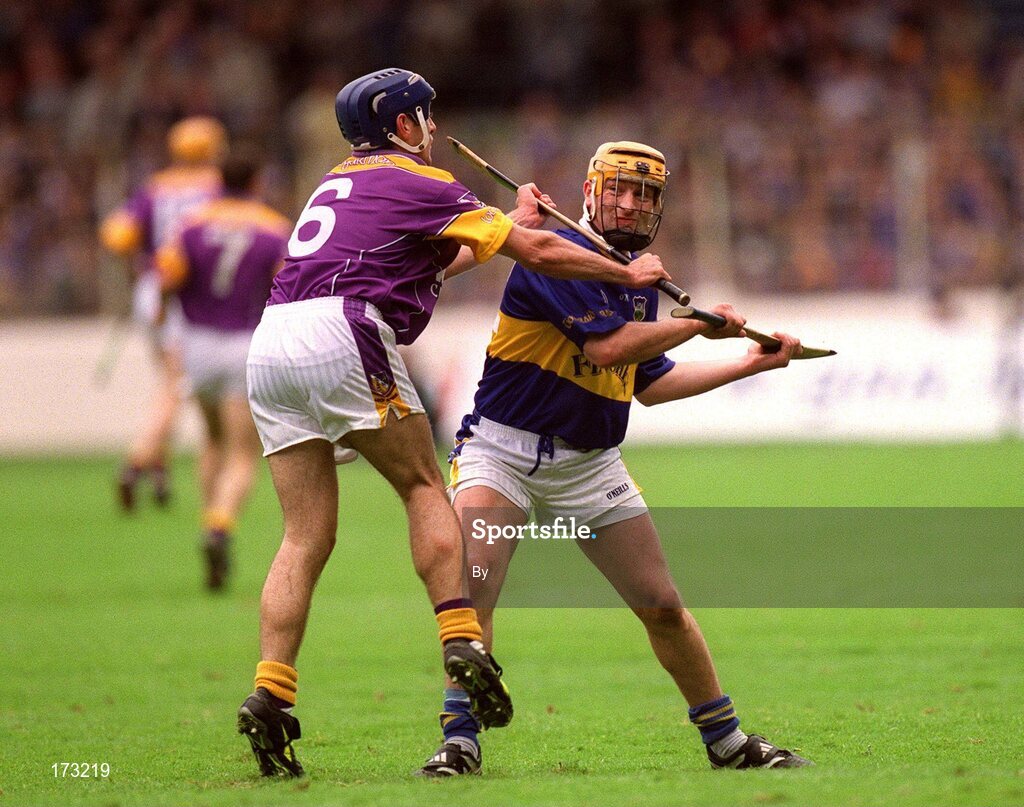 12 August 2001; Liam Cahill, Tipperary, in action against Wexford's Liam Dunne. Tipperary v Wexford, Guinness All-Ireland Hurling Championship Semi-Final, Croke Park, Dublin. Picture credit; Damien Eagers / SPORTSFILE
