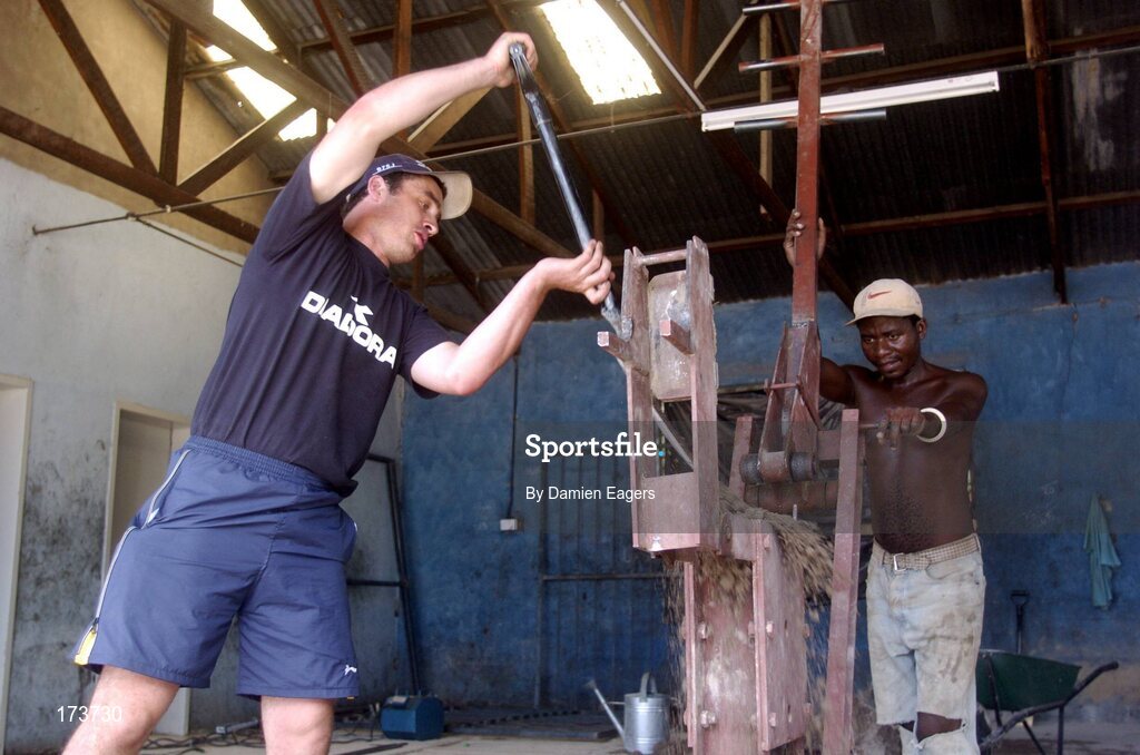 25 February 2005; Galway's Alan Kerins with labourer Alex working on the block making project. Cheshire home for the physically challenged children, Mongu, Zambia. Picture credit; Damien Eagers / SPORTSFILE