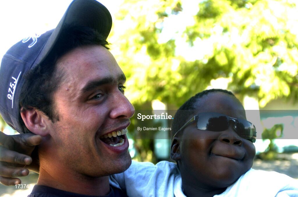 25 February 2005; Galway's Alan Kerins with Lubasi. Cheshire home for the physically challenged children, Mongu, Zambia. Picture credit; Damien Eagers / SPORTSFILE