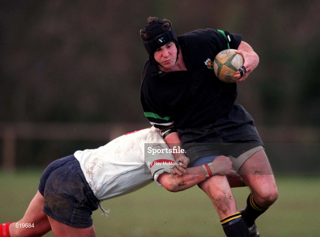 27 February 1999; Bruce Wood of DSLP is tackled by Paul Henderson of Malone during the AIB All-Ireland League Division 2 match between DLSP and Malone at Kilternan Park in Dublin. Photo by Ray McManus/Sportsfile