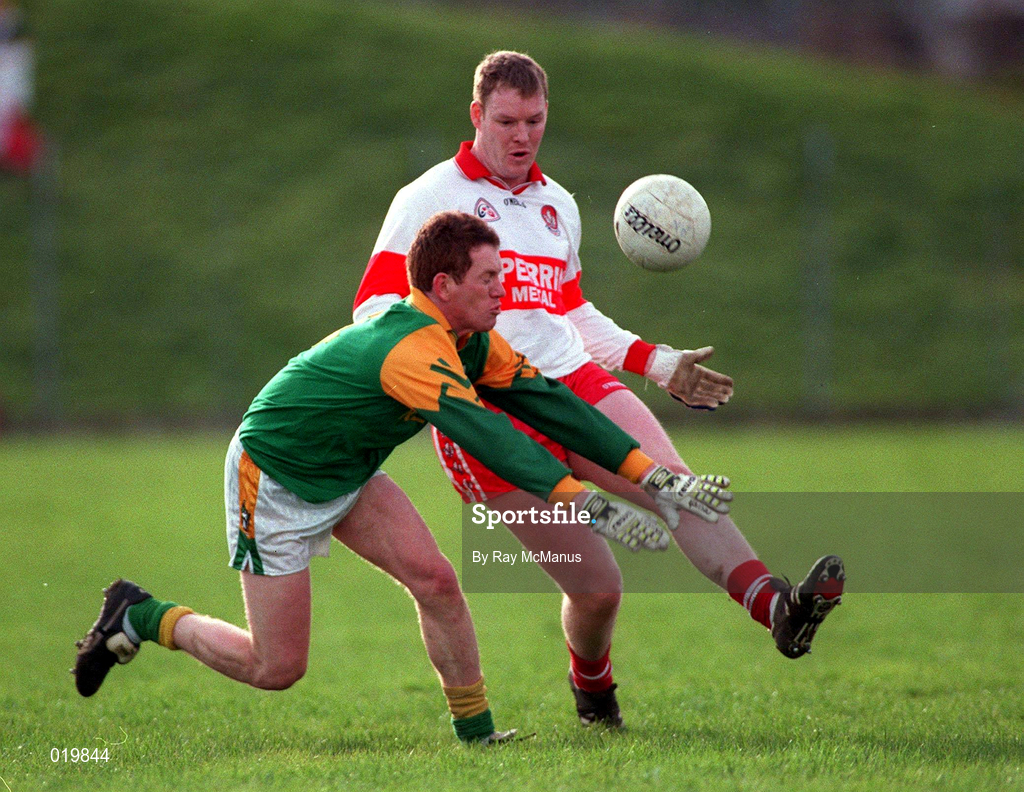 28 Feburary 1999; Donal Curtis of Meath in action against Dermot Heaney of Derry during the Church and General National Football League Division 1 match between Meath and Derry at Páirc Tailteann in Navan, Meath. Photo by Ray McManus/Sportsfile