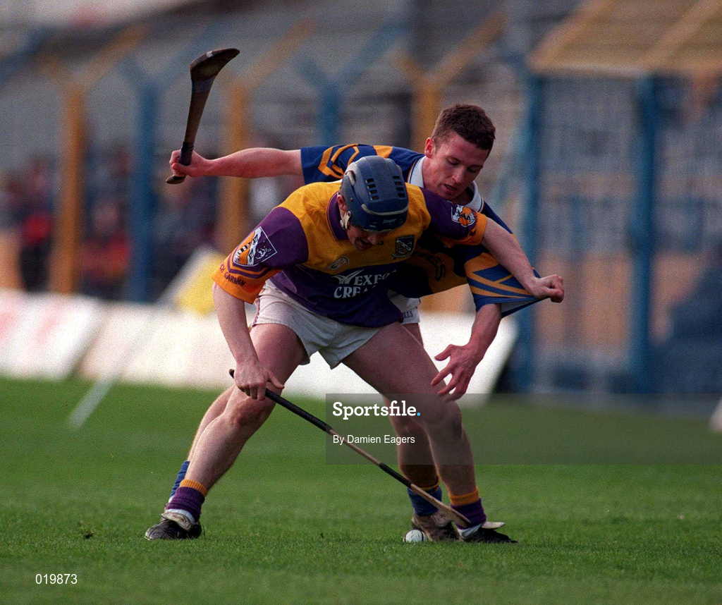 21 March 1999; Eugene Furlong of Wexford in action against Declan browne of Tipperary during the Church and General National Hurling League Division 1B match between Tipperary and Wexford at Semple Stadium in Thurles, Tipperary. Photo by Damien Eagers/Sportsfile
