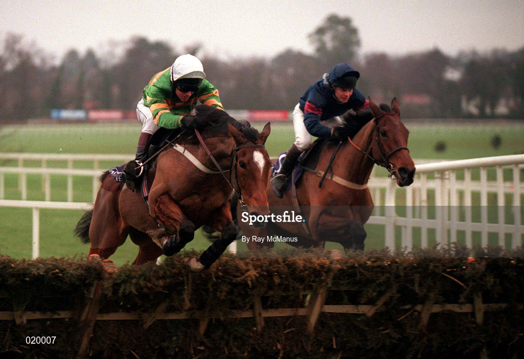 24 January 1999; Istabraq, with Charlie Swan up, clears the last ahead of French Holly, with Adrian Maguire up, on their way to winning the AIG Championship Hurdle at Leopardstown Racecourse in Dublin. Photo by Ray McManus/Sportsfile