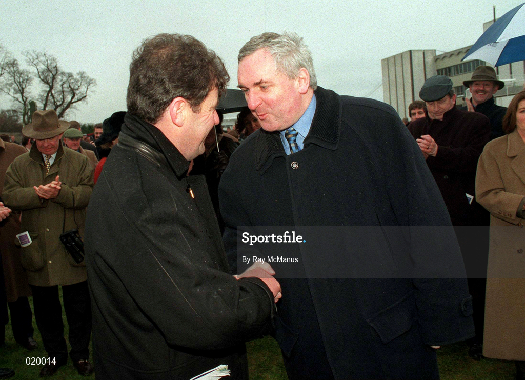 24 January 1999; An Taoiseach Bertie Ahern, right, congratulates Istabraq owner JP McManus after winning the AIG Championship Hurdle at Leopardstown Racecourse in Dublin. Photo by Ray McManus/Sportsfile