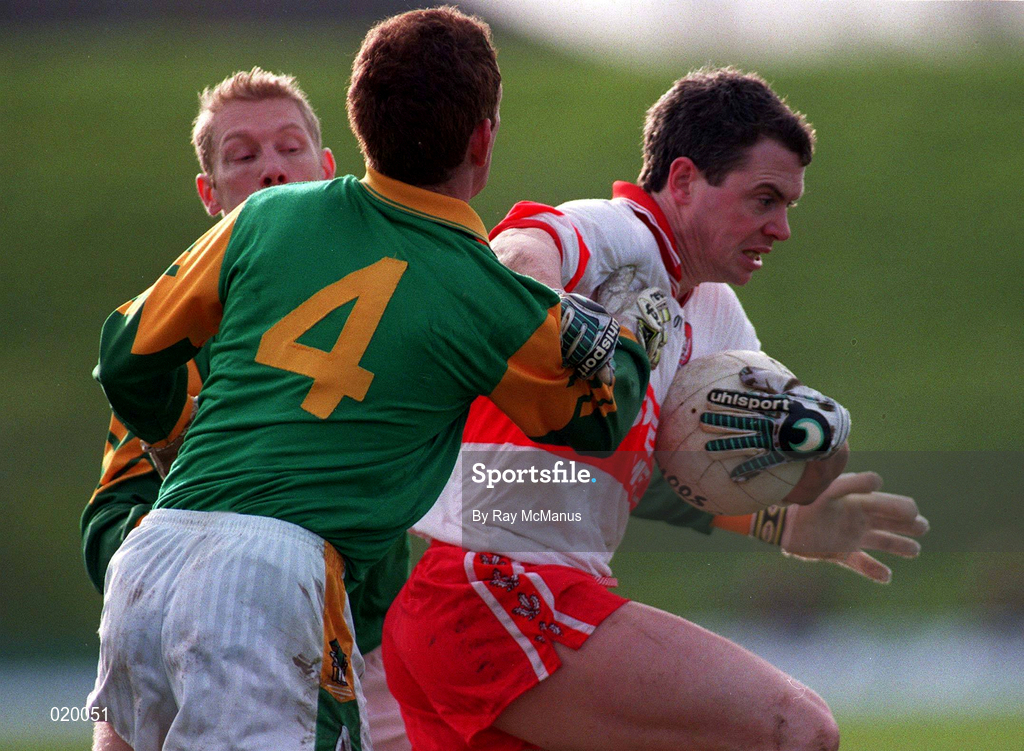 28 Feburary 1999; Joe Brolly of Derry in action against Graham Geraghty, left, and Donal Curtis of Meath during the Church and General National Football League Division 1 match between Meath and Derry at Páirc Tailteann in Navan, Meath. Photo by Ray McManus/Sportsfile