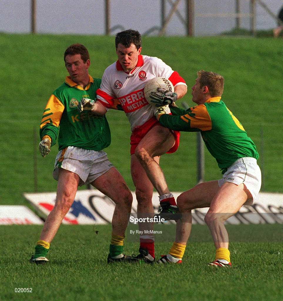 28 Feburary 1999; Joe Brolly of Derry in action against Graham Geraghty, right, and Donal Curtis of Meath during the Church and General National Football League Division 1 match between Meath and Derry at Páirc Tailteann in Navan, Meath. Photo by Ray McManus/Sportsfile