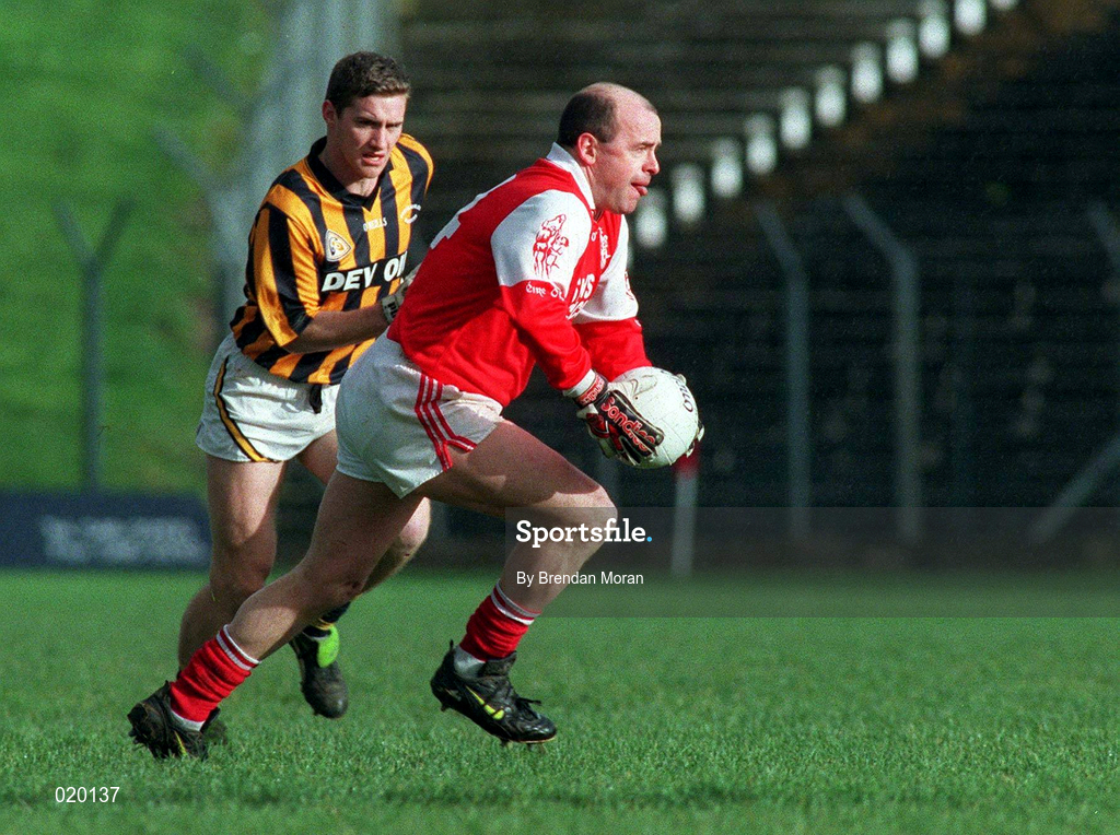 21 February 1999; Leo Turley of Éire Og in action against Frank Shields of Crossmaglen Rangers during the AIB All-Ireland Senior Club Football Championship Semi-Final match between Crossmaglen Rangers and Éire Og at Páirc Tailteann in Navan, Meath. Photo by Brendan Moran/Sportsfile