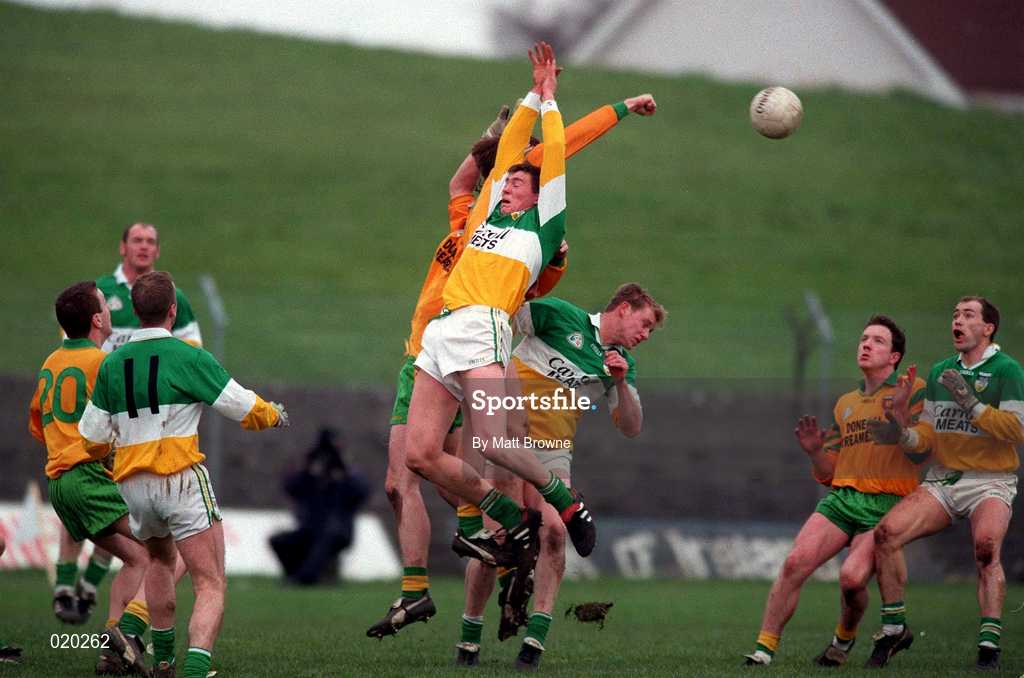 14 March 1999; Ciarain McManus, left, and Colm Quinn of Offaly in action against Jim Guinness and James Ruane of Donegal during the Church and General National Football League Division 1 match between Offaly and Donegal at O'Connor Park in Tullamore, Offaly. Photo by Matt Browne/Sportsfile