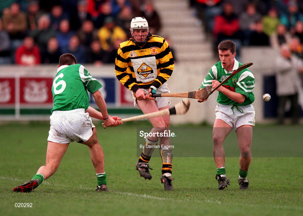 28 February 1999; Paul Codd of Rathnure in action against Michael Pucci, left, and Barry Smyth of Ballygalget during the AIB All-Ireland Senior Club Hurling Championship Semi-Final match between Rathnure and Ballygalget at Parnell Park in Dublin. Photo by Damien Eagers/Sportsfile