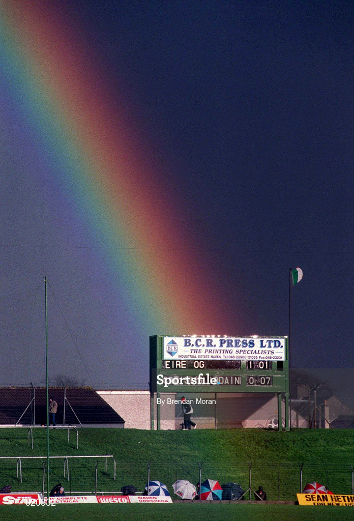 21 February 1999; A rainbow falls in front of the scoreboard during a heavy rainshower at half-time of the AIB All-Ireland Senior Club Football Championship Semi-Final match between Crossmaglen Rangers and Éire Og at Páirc Tailteann in Navan, Meath. Photo by Brendan Moran/Sportsfile