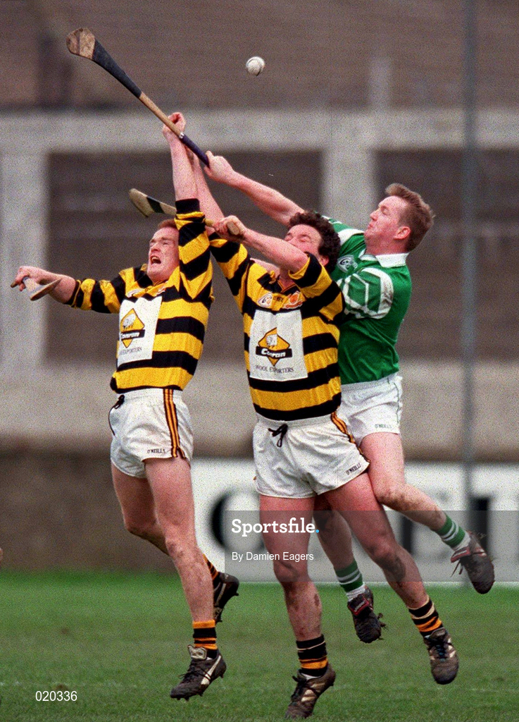 28 February 1999; Rod Guiney, left, and Martin Byrne of Rathnure in action against Michael Pucci of Ballygalget during the AIB All-Ireland Senior Club Hurling Championship Semi-Final match between Rathnure and Ballygalget at Parnell Park in Dublin. Photo by Damien Eagers/Sportsfile