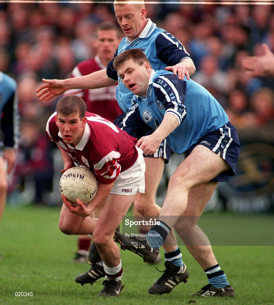 14 March 1999; Richie Fahy of Galway in action against Dessie Farrell and Declan Darcy of Dublin during the Church and General National Football League Division 1 match between Dublin and Galway at Parnell Park in Dublin. Photo by Brendan Moran/Sportsfile