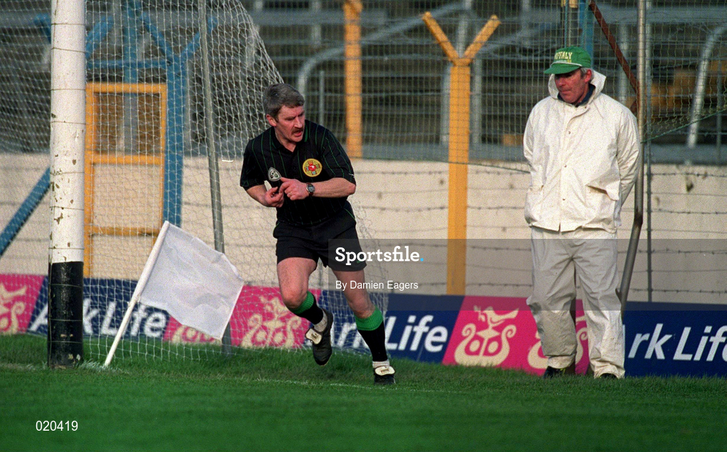 21 February 1999; Referee Pat Horan moves away to resume his duties after discussing Athenry's claim for a last minute point with the match umpire during the AIB All-Ireland Senior Club Hurling Championship Semi-Final match between St Joseph's Doora Barefield and Athenry at Semple Stadium in Thurles, Tipperary. Photo by Damien Eagers/Sportsfile