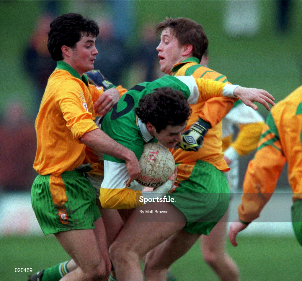 14 March 1999; Vinny Claffey of Offaly is tackled by Niall McCready, left, and James Ruane of Donegal during the Church and General National Football League Division 1 match between Offaly and Donegal at O'Connor Park in Tullamore, Offaly. Photo by Matt Browne/Sportsfile