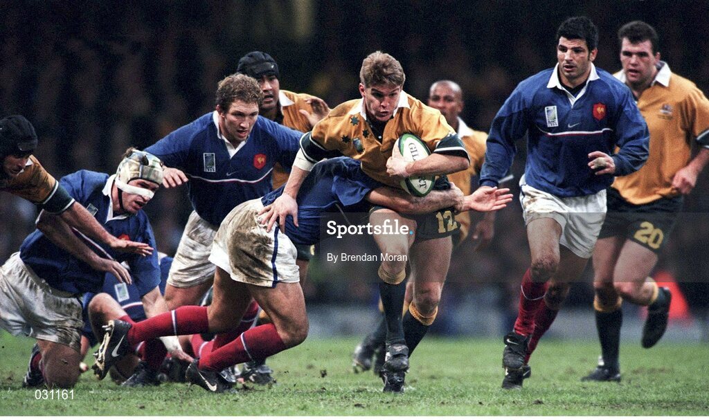 6 November 1999; Tim Horan, Australia, in action against Raphael Ibanez, France.1999 Rugby World Cup, Australia v France, Millennium Stadium, Cardiff, Wales. Picture credit: Brendan Moran / SPORTSFILE