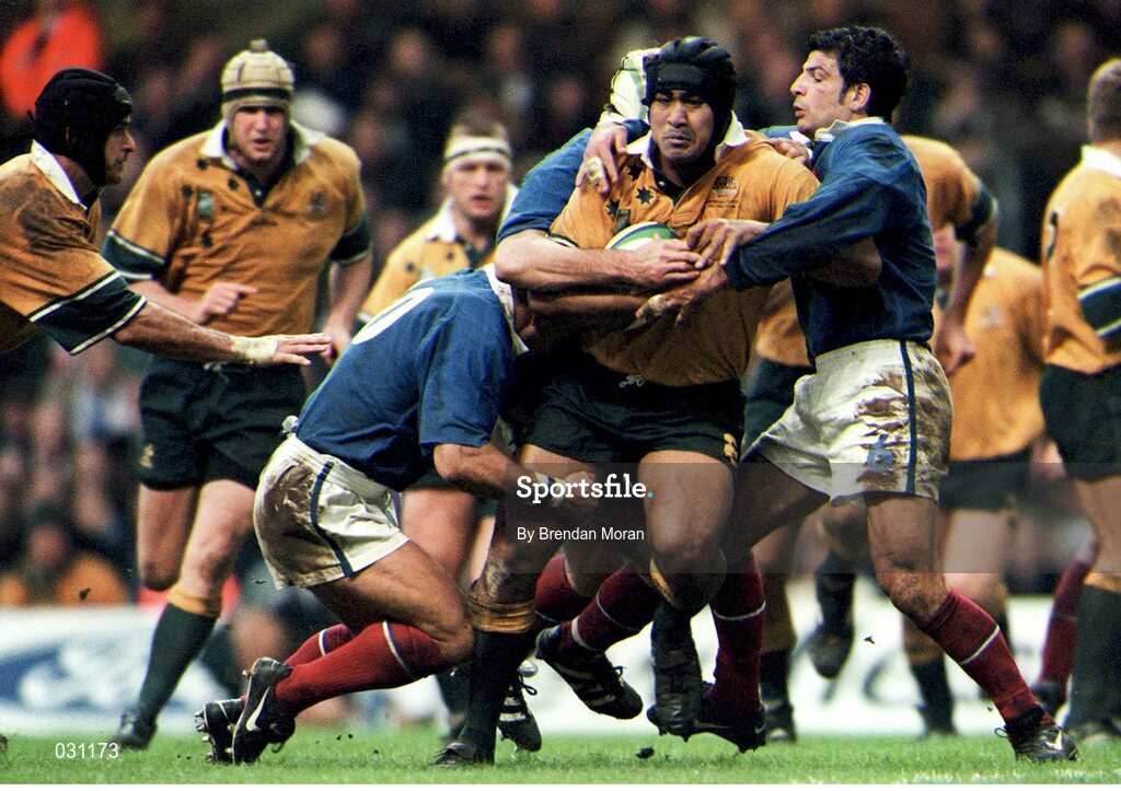 6 November 1999; Toutai Kefu, Australia, in action against Christophe Lamaison, left, and Marc Liévremont, France.1999 Rugby World Cup, Australia v France, Millennium Stadium, Cardiff, Wales. Picture credit: Brendan Moran / SPORTSFILE