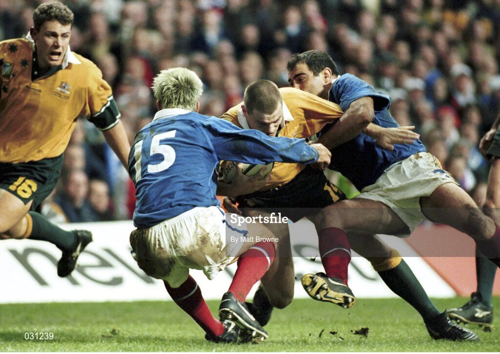 6 November 1999; Ben Tune, Australia, supported by team-mate Jason Little, no.16, goes for the tryline as France's Xavier Garbajosa, no.15, and Raphael Ibanez attempt to stop him. 1999 Rugby World Cup, Australia v France, Millennium Stadium, Cardiff, Wales. Picture credit: Matt Browne / SPORTSFILE
