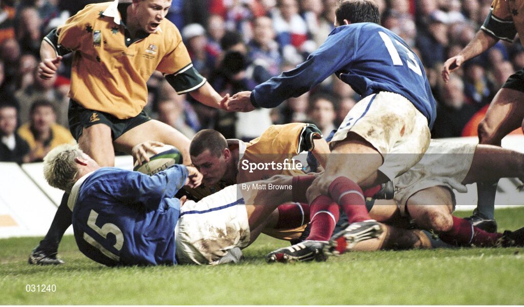 6 November 1999; Ben Tune, Australia, supported by team-mate Jason Little, no.16, goes over the line for a try as France's Xavier Garbajosa, no.15, and Richard Dourthe, no.13, attempt to stop him. 1999 Rugby World Cup, Australia v France, Millennium Stadium, Cardiff, Wales. Picture credit: Matt Browne / SPORTSFILE