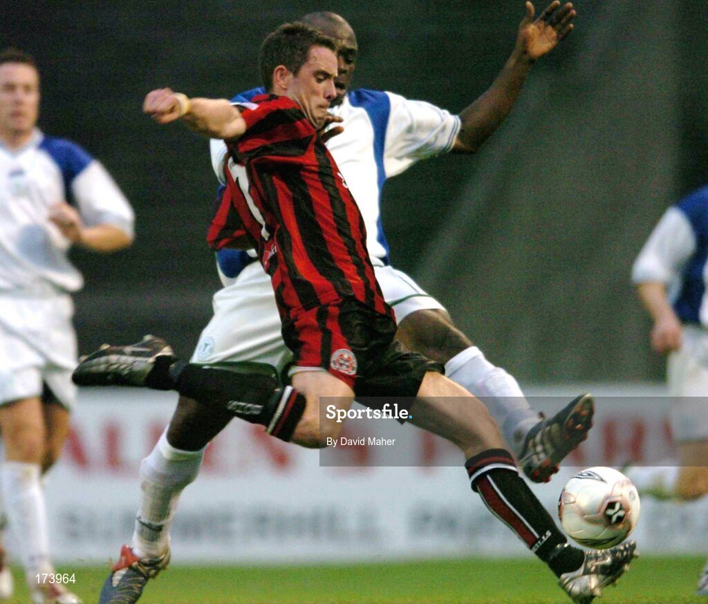 22 April 2005; Fergal Harkin, Bohemians, in action against Eloka Asokuh, Finn Harps. eircom League, Premier Division, Bohemians v Finn Harps, Dalymount Park, Dublin. Picture credit; David Maher / SPORTSFILE