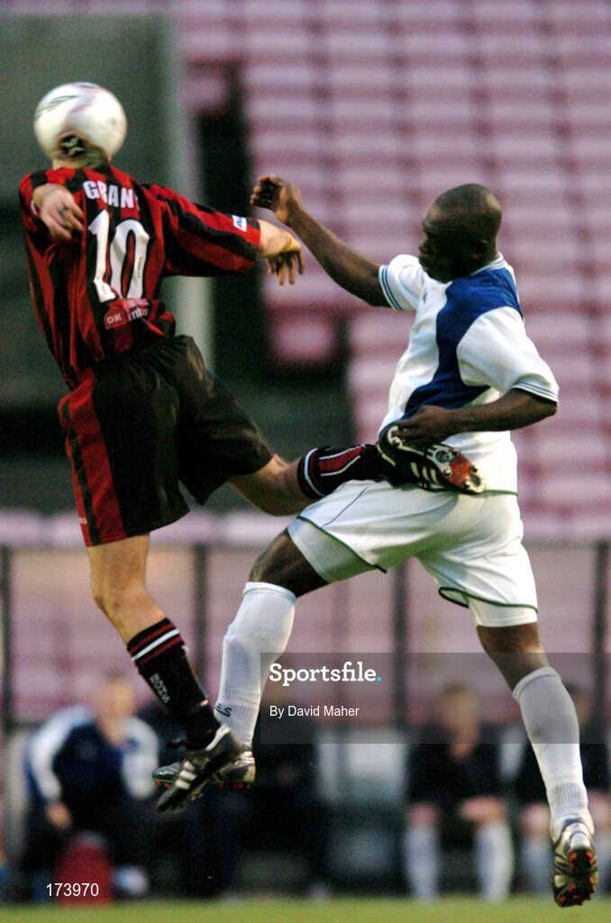 22 April 2005; Tony Grant, Bohemians, in action against Eloka Asokuh, Finn Harps. eircom League, Premier Division, Bohemians v Finn Harps, Dalymount Park, Dublin. Picture credit; David Maher / SPORTSFILE