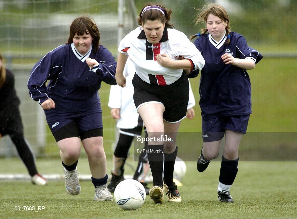 30 April 2005; Christine Simpson, Leinster, in action against Mary Strain, right, and Marion Gallagher, Ulster. Europe Eurasia Football Week 2005, Women's 7-a-side Final, Ulster v Leinster, AUL Complex, Clonshaugh, Dublin. Picture credit; Pat Murphy / SPORTSFILE