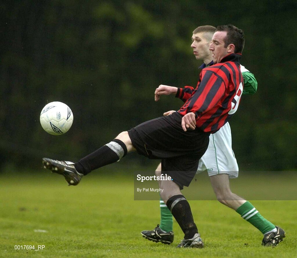 30 April 2005; Darren Flanagan, Cheeverstown, in action against David Sanlon, Belfast. Europe Eurasia Football Week 2005, Men's National Cup Final, Belfast v Cheeverstown, AUL Complex, Clonshaugh, Dublin. Picture credit; Pat Murphy / SPORTSFILE