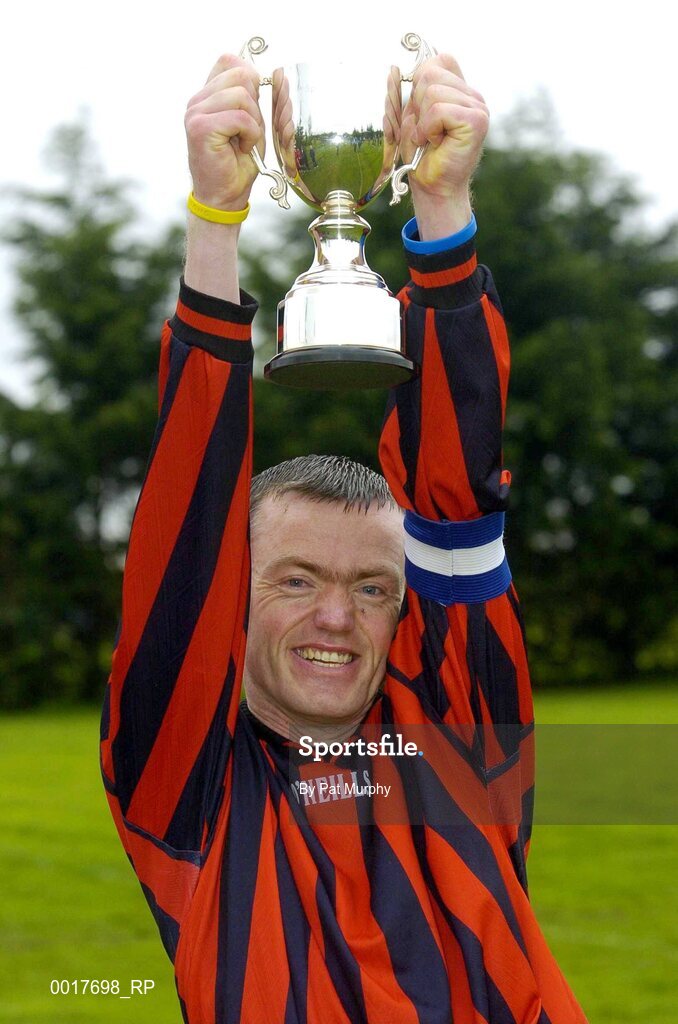 30 April 2005; John Leavy, Cheeverstown, lifts the cup after victory over Belfast. Europe Eurasia Football Week 2005, Men's National Cup Final, Belfast v Cheeverstown, AUL Complex, Clonshaugh, Dublin. Picture credit; Pat Murphy / SPORTSFILE