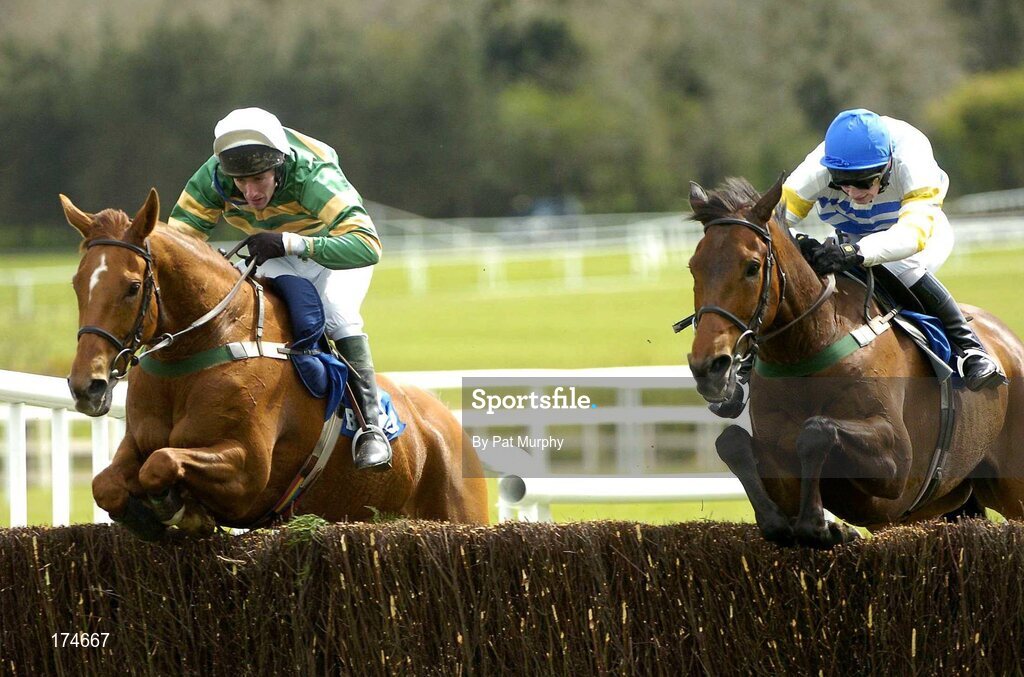 28 April 2005; Good Step, left, with John Thomas McNamara up, jumps the last alongside eventual second placed Shady Lad, with Nina Carberry up, on their way to winning the Blue Square Steeplechase (La Touche Cup). Punchestown Racecourse, Co. Kildare. Picture credit; Pat Murphy / SPORTSFILE
